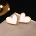Personalized Black And White Beimu Peach Heart Titanium Steel Vacuum Plated Gold Non Fading Earrings Jewelry_ipsvogv.com