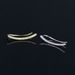 Unisex personality angel eye ear bone studs female geometric lightning screw buckle ear studs foreign trade piercing zircon earrings_ipsvogv.com
