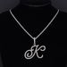 Station jewelry micro inlaid zircon cursive 26 English letter pendant hip hop necklace men and women_ipsvogv.com