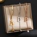 D Letter Necklace Women's Versatile Square Tassel Pendant Titanium Steel Lock Bone Chain Colorless Jewelry_ipsvogv.com