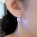 Cao Shichao's Sparkling Mosang Stone Exquisite With Simple Round Four Claw , Elegant And Small Female_ipsvogv.com