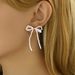 Fashion OL Bow Personalized Double layer Hollow Pearl Earrings Female Versatile Design Ear Bone Nails_ipsvogv.com