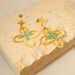 INS Network Red Drops Oil Four Leaf Grass Titanium Steel Earrings For Female Minors High Grade Feel Plating Gold Simple And Versatile Earrings_ipsvogv.com