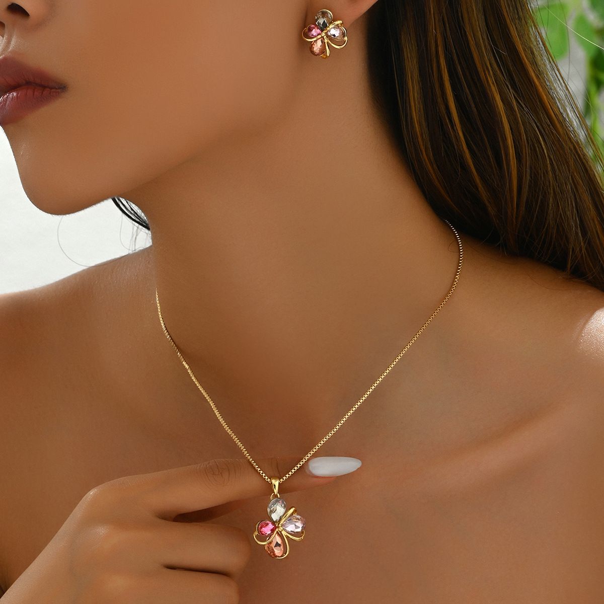 A niche Korean style women's earring and jewelry set with personalized inlaid water droplet geometric design, long_ipsvogv.com