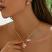 A niche Korean style women's earring and jewelry set with personalized inlaid water droplet geometric design, long_ipsvogv.com