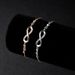 E025 Adjustable Pull-out 8-shaped With Micro Inlaid Zircon Hot Selling Bracelet For Women's Accessories_ipsvogv.com