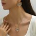 2024 New Love Diamond Hip Hop Style Necklace Earring Set Angel Eye Niche Earrings Versatile Clavicle Chain_ipsvogv.com