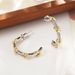 Love Knot C Shaped Earrings Gold And Silver Contrast Winding Temperament Simple Ins Inlaid Zirconium Earrings High End Niche Female Earrings_ipsvogv.com
