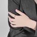 Simple light luxury hollow heart shaped titanium steel female ring ring fashionable commuting wear accessories_ipsvogv.com