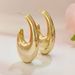 Trendy U-shaped earrings for women with gold oval stud earrings_ipsvogv.com