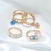 New Punk Street Style Devil's Eye With Diamond Drip Oil Hollow 4-piece Ring Set_ipsvogv.com