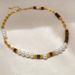 French High-end Tiger Eye Stone Pearl Bead Pig Nose Splicing Necklace With Light Luxury And Fashionable Temperament_ipsvogv.com