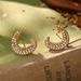 Court Style Russian Gold Niche New Medieval Earrings Tassels Inlaid Pearls Tiger Eye Design High End Earrings_ipsvogv.com