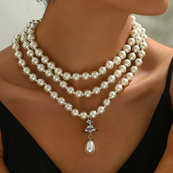 Light luxury style women's pearl with multiple layers, simple and niche design, diamond studded long collarbone chain_ipsvogv.com