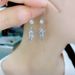 Cao Shi's diamond earrings for women's new design, showing off the trend of slim earrings to the small crowd_ipsvogv.com