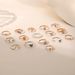 Fashionable And Personalized Diamond Pearl Pentagram Arrow Shaped Eye Opening 16 Piece Set Ring_ipsvogv.com