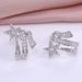 Cao Shichao Xian Designed A Double Layered Winding The Sun, Moon, With An Open Ring For Shooting Stars, Earrings, And_ipsvogv.com