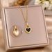 Light Luxury Stainless Steel Peach Pendant With Niche Design, Double-sided Black And White Heart Necklace, Collarbone_ipsvogv.com