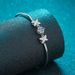 XDY Pure Silver Women's Plating Pt950 Gold Four Claw One Carat Moissanite Bracelet Straight_ipsvogv.com