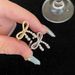 Cold Wind Butterfly Knot Pearl For Women 2024 New Style Ring, Light Luxury, Niche Design, Open Finger Ring_ipsvogv.com