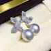 Cao Shi Butterfly Pearl Jewelry Set Exquisite Zircon Earrings Female Sweet Box Chain Pendant_ipsvogv.com