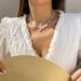Bohemian crushed stone crystal versatile collarbone chain, European and American ethnic style star leaf shell necklace, female niche design_ipsvogv.com