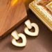 Elegant Hollowed Out Heart-shaped Pendant With Feminine Temperament, Simple And High-end Silver Needle Earrings_ipsvogv.com