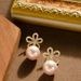 French Elegant Personalized Hollow Out Five Petal Flower Pearl Pendant For Women With A Sense Of Luxury And Temperament,_ipsvogv.com