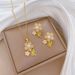 【 Titanium Steel 】 Necklace Earring Light Luxury Full Diamond Drip Oil Flower Personalized Temperament Banquet Earrings_ipsvogv.com