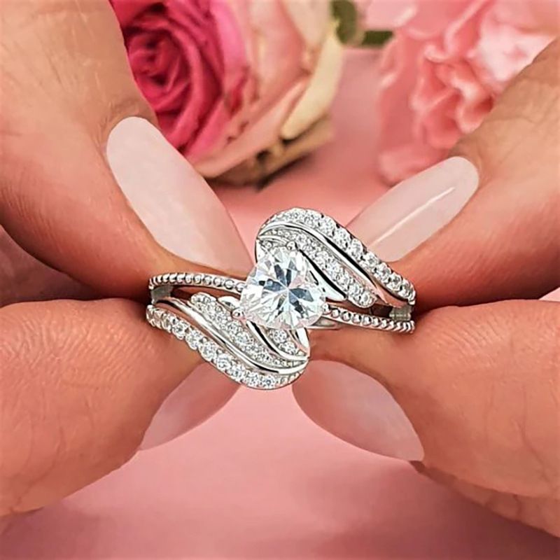 Unisex Jewelry Fashion love ring swing arm design Angel feather wings heart-shaped women's fashion jewelry_ipsvogv.com