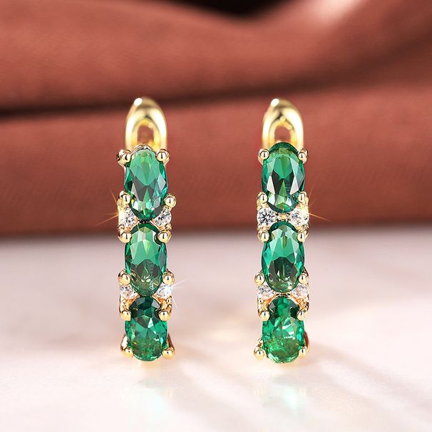 Cao Shi's Are Versatile Luxurious, Exuding A Sense Of Luxury And Sophistication. They Feature Oval Shaped Green Earrings_ipsvogv.com