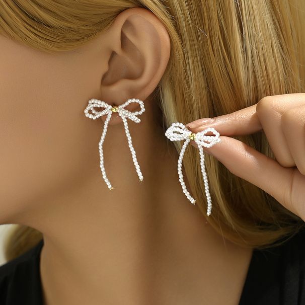 Fashion OL Bow Personalized Double layer Hollow Pearl Earrings Female Versatile Design Ear Bone Nails_ipsvogv.com