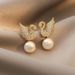 Light luxury high-grade sense of temperament swan zircon pearl earrings simple personality earrings female_ipsvogv.com