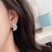 Cao Shi's Water Drop Flower Ear Nails Are Elegant And Refined For Women, Paired With Delicate Fragrances_ipsvogv.com