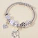 Family Stainless Steel Cat Eye Crystal Crown Love Pendant Element Couple Style Bracelet_ipsvogv.com