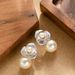 French Exquisite Fashion High Gloss Shi Jia Pearl Flower For Women With Versatile Temperament And High-end Silver Needle_ipsvogv.com