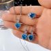 Cao Shi Live New Trend Topa Blue Zircon Ocean Heart Shaped Pendant Ring Earring Set For Women_ipsvogv.com