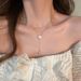 Double layer pearl camellia necklace women Xia light luxury niche design senior neck chain tassel chain accessories_ipsvogv.com