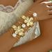 American hip-hop style women's bracelet personalized flowers inlaid with pearls, featuring a niche design and handmade_ipsvogv.com