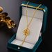 Fashion Trend Titanium Steel Non-fading Sweater Chain Gold Plated Red Auspicious Circle Bone Clavicle Chain_ipsvogv.com