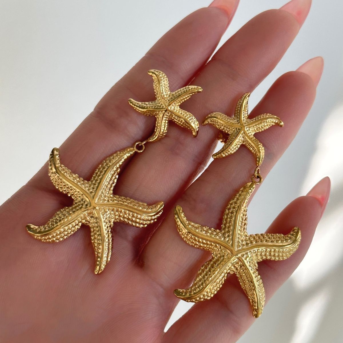 Fashionable Niche INS Titanium Vintage Large And Small Starfish Embossed Versatile Earrings_ipsvogv.com