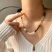 French High-end Tiger Eye Stone Pearl Bead Pig Nose Splicing Necklace With Light Luxury And Fashionable Temperament_ipsvogv.com
