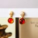 French style oil drop three-dimensional camellia pearl earrings with a high-end feel, niche zircon silver needle_ipsvogv.com