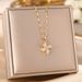 the Same Type Of Four Leaf Windmill Rotary Pendant Titanium Steel Lock Bone Chain Versatile Non Fading Necklace_ipsvogv.com
