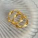 Electroplated Titanium Steel Retro Embossed Twist Large Earrings_ipsvogv.com