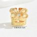 A niche Korean version of copper zircon inlaid with simple bow design women. The ring has an adjustable opening for the_ipsvogv.com