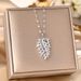 Titanium Steel Necklace, Female Copper Inlaid Zircon Pendant, Feather Leaf, Collarbone Chain, Love Wing Accessory_ipsvogv.com