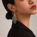 INS Light Luxury Metal Minimalist Style Gold-Plated Hollow Leaf Design Sense Drop Earrings For Women_ipsvogv.com
