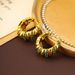Light luxury temperament circle personality element circle, high-end feeling, green zirconium earrings, fashionable_ipsvogv.com