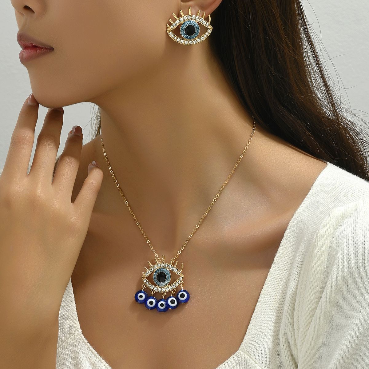 Instagram versatile hip-hop style women's earring necklace set with personalized devil's eye diamond design earrings and_ipsvogv.com